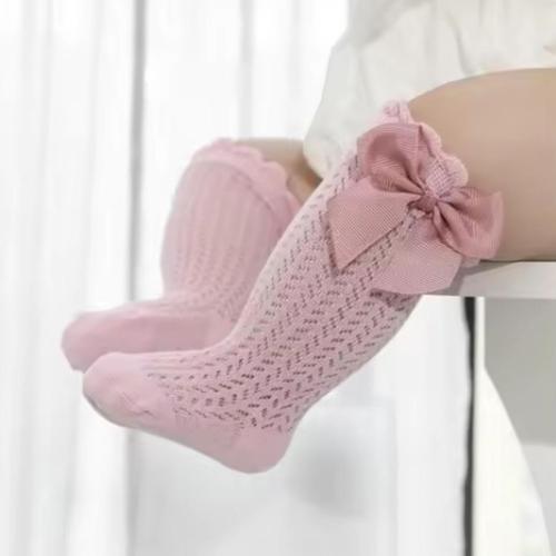 Calceta larga calada con moño