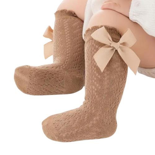 Calceta larga calada figura moño